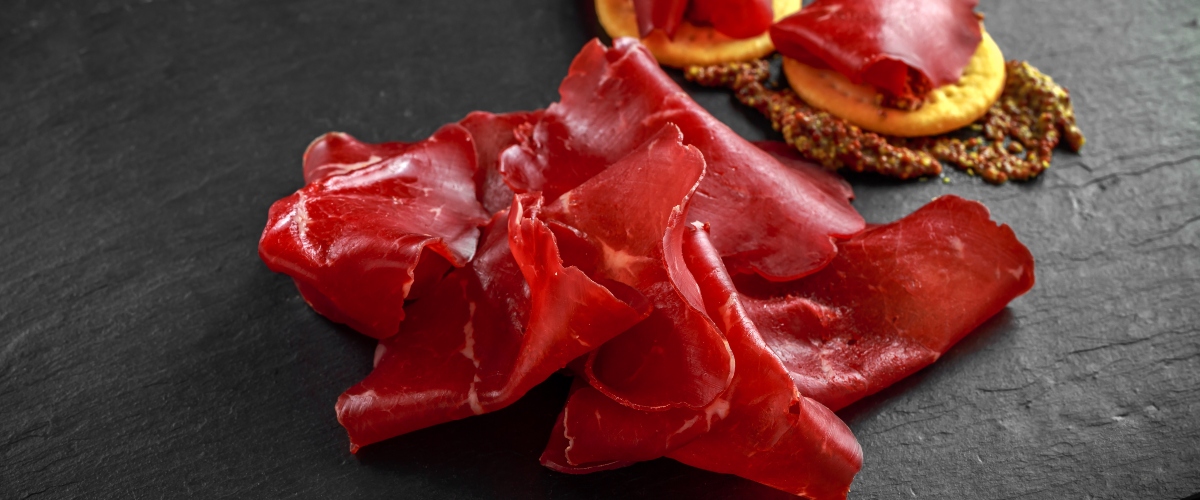 From Ancient Kitchens to Modern Palates: The Fascinating Journey of Italian Cured Meats