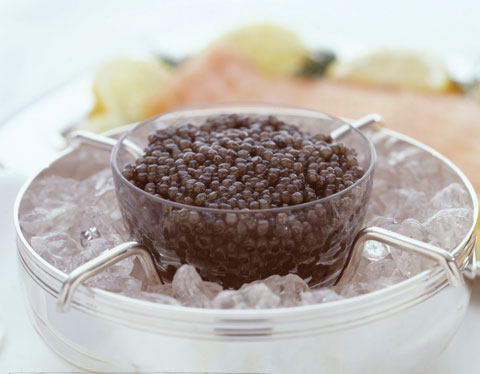 Russian caviar in silver caviar server by Marky's